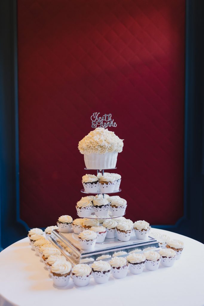 Wedding cake and cupkaces at the Slane Castle Gandon Room during the wedding dinner.