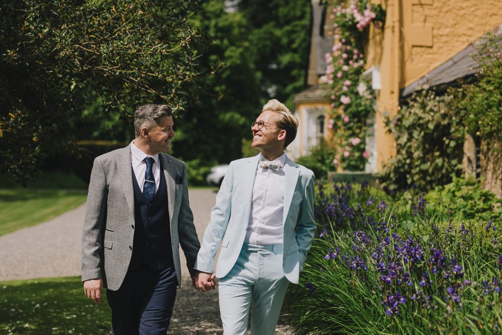 Martinstown house wedding on a sunny summer day with 2 gays outdoor ceremony